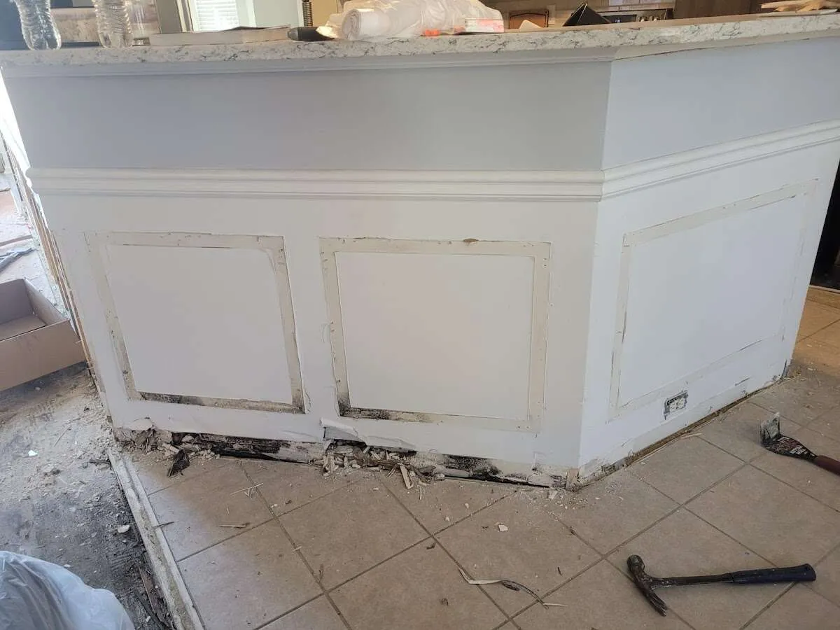 Water damage and mold on kitchen during Sewage Cleanup & Sanitation in Osage Beach